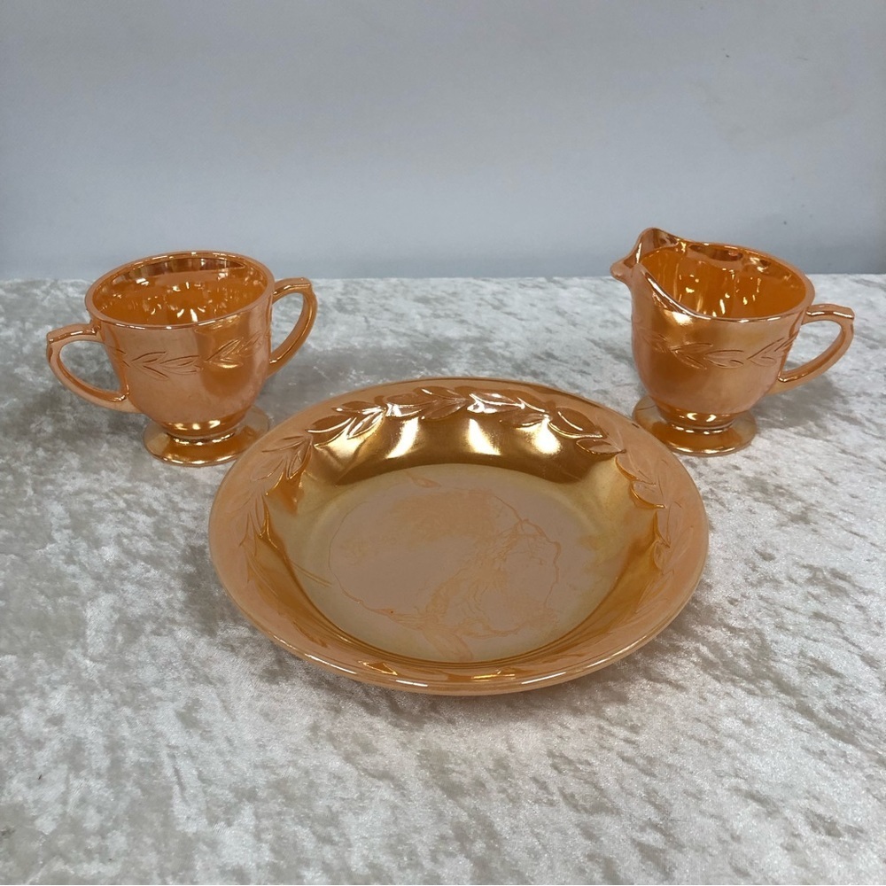 Fire King vintage peach iridescent cream sugar set FLAWED